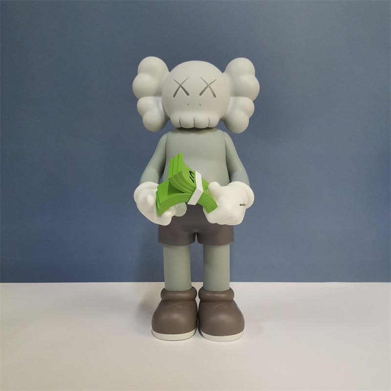 KAWS Cash | Kamal Enterprises